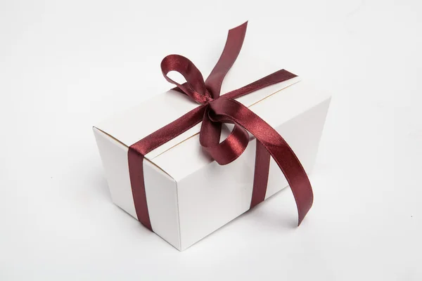 Handmade chocolates in a gift box with beautiful bow in — Stock Photo, Image