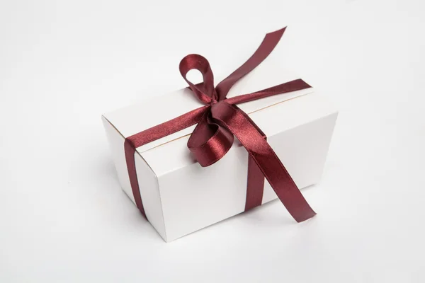 Handmade chocolates in a gift box with beautiful bow in — Stock Photo, Image