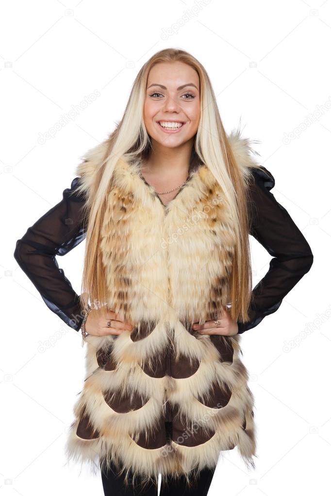 Young beautiful blond woman in a red fur vest