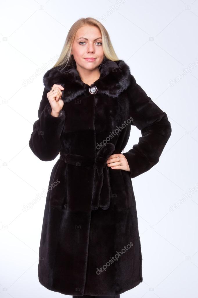 Beautiful blonde in fur coat cleared Beautiful blonde in fur coat