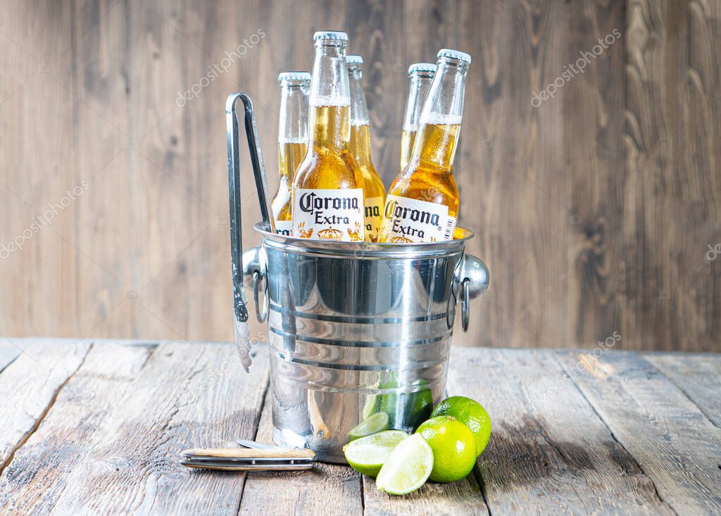 KHARKIV, UKRAINE - 30 June, 2020: Illustrative editorial of Corona Beer bottles in the metal bucket.