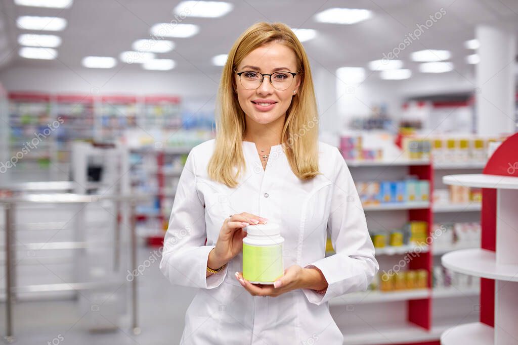 good-looking apothecary recommends the drug for treatment