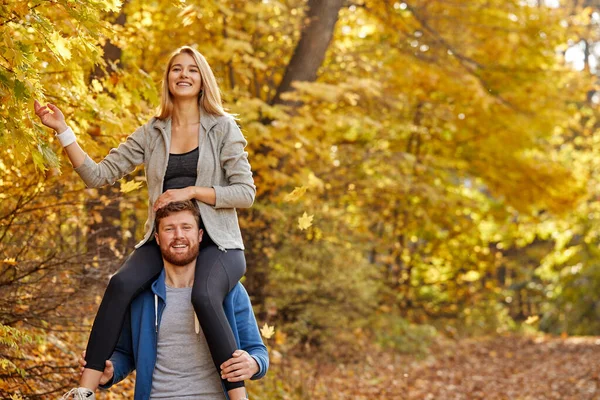 Lovely caucasian couple enjoy the walk in the forest — Stock Photo, Image