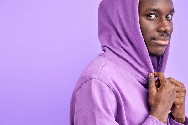 Stylish dark skinned male model in pullover looks at camera — Stock Photo, Image
