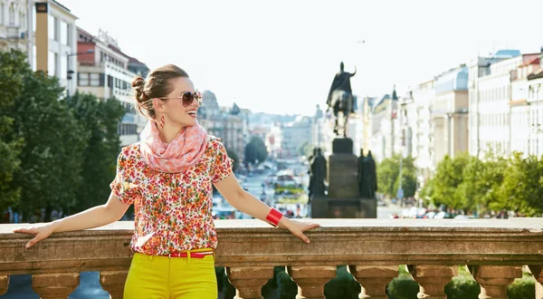 Woman standing near National Museum in Prague and looking aside — Stockfoto