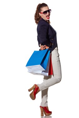 kadın alışveriş torbaları eğleniyor güneş gözlüğü ile beyaz tarih zaman