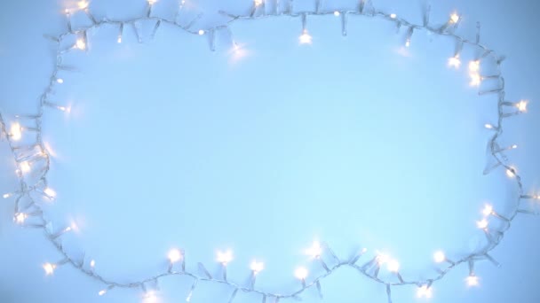 Feliz Navidad Piso Con Luces Navidad Sobre Fondo Azul Este — Vídeos de Stock