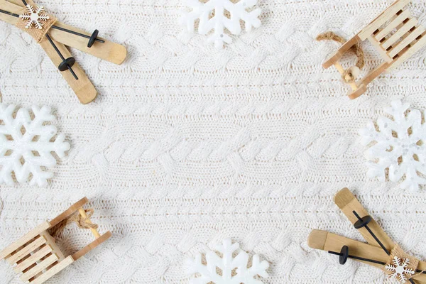 Winter Flat Lay Snowflakes Sleds Skis White Knitted Background — Φωτογραφία Αρχείου