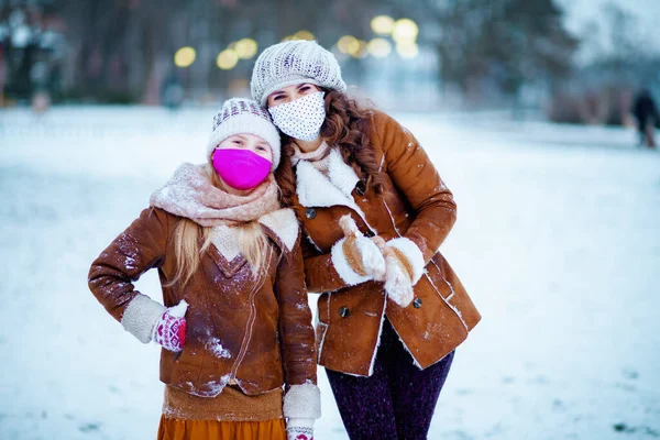 Portrait Modern Mother Daughter Knitted Hats Sheepskin Coats Mittens Medical — Stock Photo, Image
