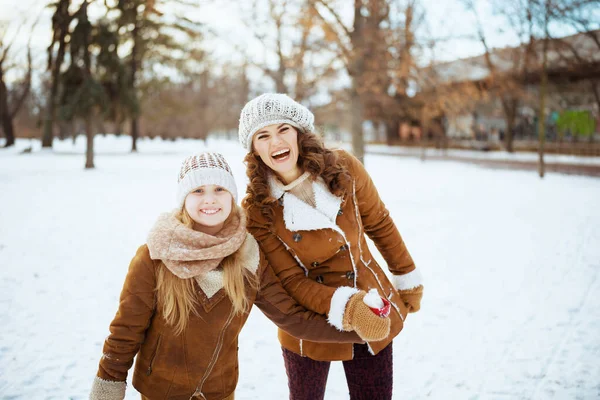 Smiling Modern Mother Daughter Knitted Hats Sheepskin Coats Mittens Knitted — Stock Photo, Image