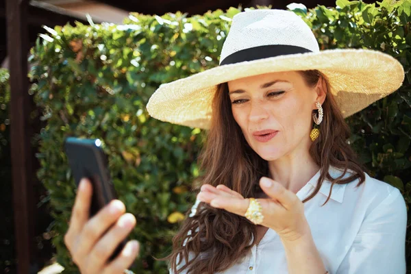 Smiling Years Old Woman White Shirt Hat Talking Video Call — Stock Photo, Image