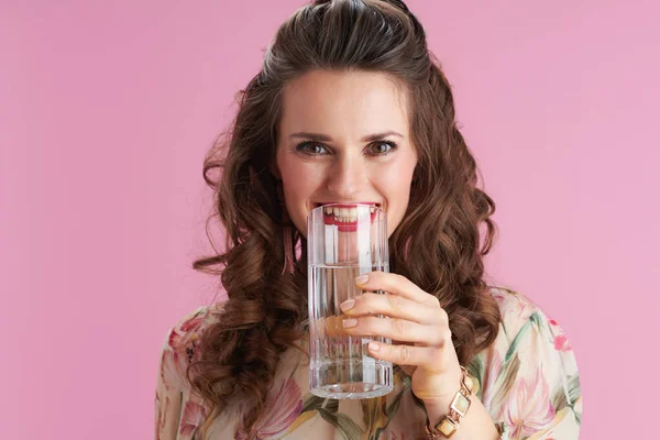 Portrait Smiling Young Woman Floral Dress Glass Water Isolated Pink — Stock Photo, Image