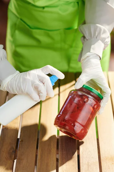 Closeup Woman Green Apron Modern Kitchen Disinfecting Groceries Supermarket — Stock Photo, Image