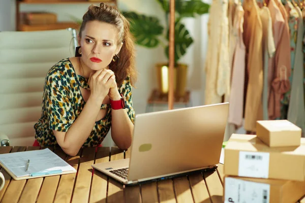 Pensive Young Small Business Owner Woman Laptop Office — Stock Photo, Image