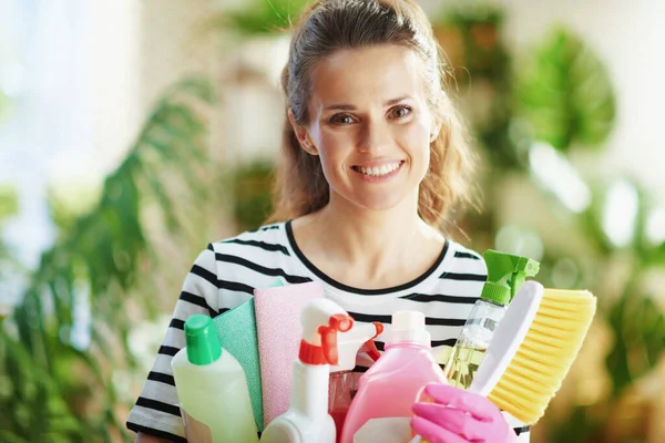 Smiling Modern Housewife Striped Shirt Cleaning Supplies Modern House Sunny — Stock Photo, Image