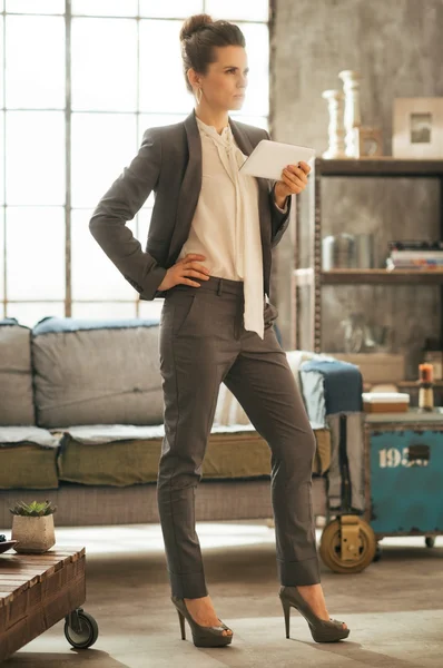 Full length portrait of business woman using tablet pc in loft a — Stock Photo, Image