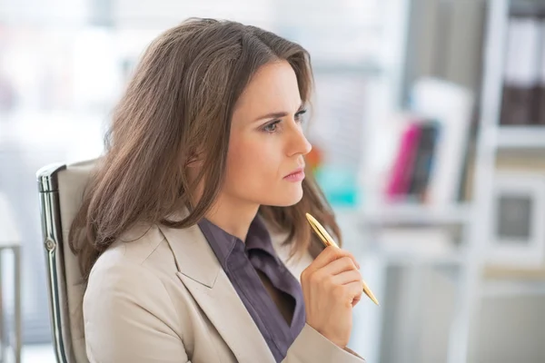Portrait of thoughtful business woman at work — Stock Photo, Image
