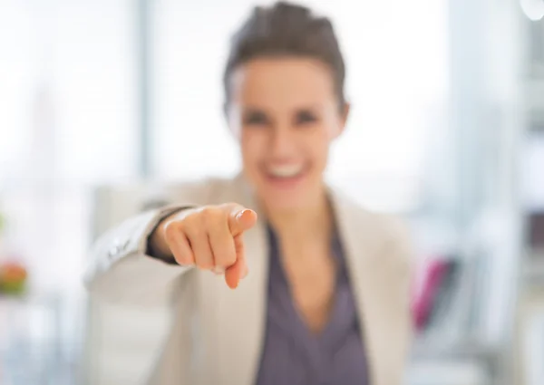 Closeup on happy business woman pointing in camera — Stock Photo, Image