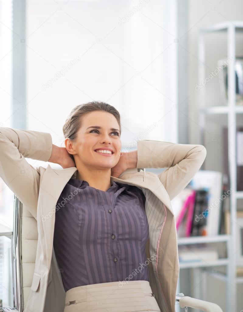 Portrait of relaxed business woman in office