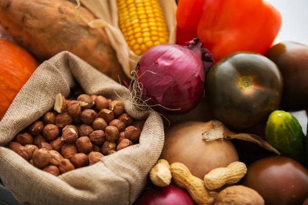 Closeup on fresh vegetables and nuts — Stock Photo, Image