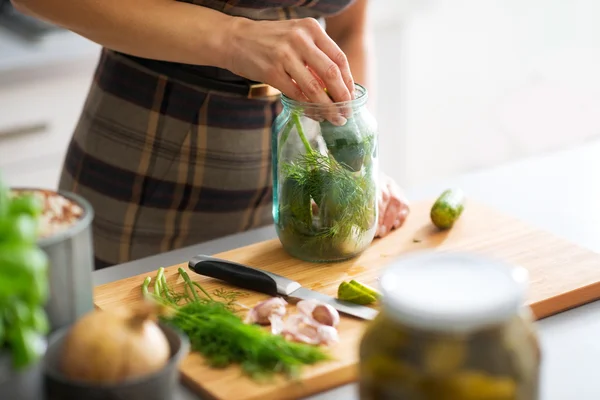 Closeup on young housewife pickling cucumbers — Stock Image Closeup on young housewife pickling cucumbers Stock Picture