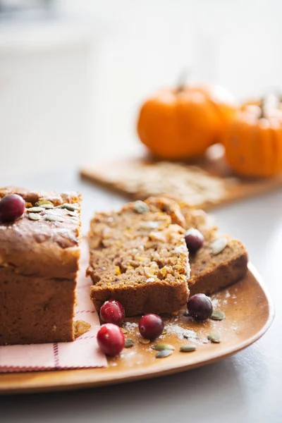 Closeup on freshly baked pumpkin bread with seeds — Stock Photo, Image