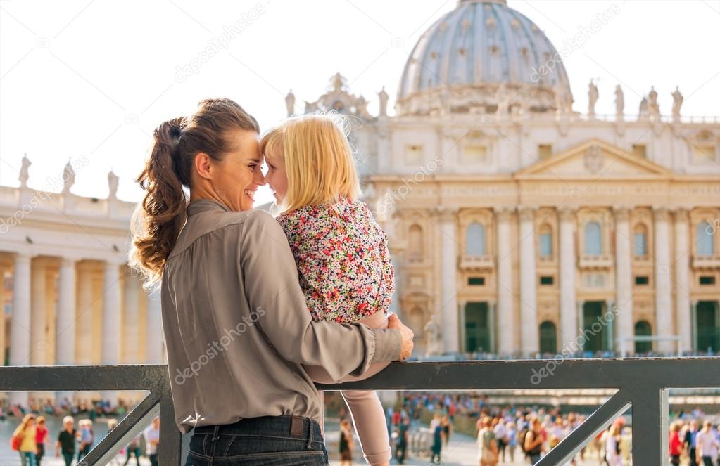 Eskimo kisses between mother and child at the Vatican in Rome