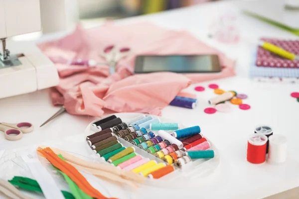 Closeup on tailor work desk — Stock Photo, Image