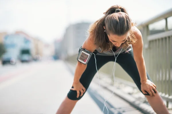 Portrait of tired fitness young woman catching breathe — Stock Photo, Image