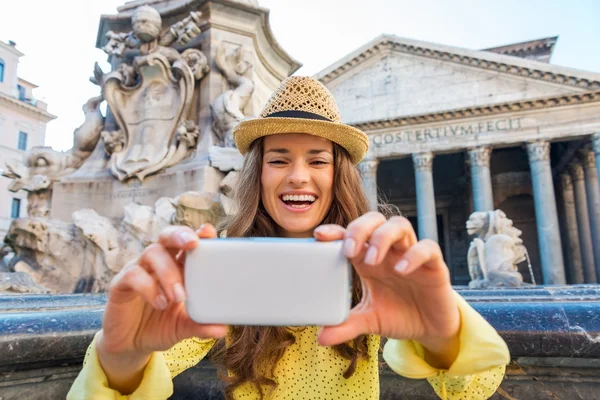 Happy woman laughing as she is checking her photo at Pantheon — Stock Photo, Image