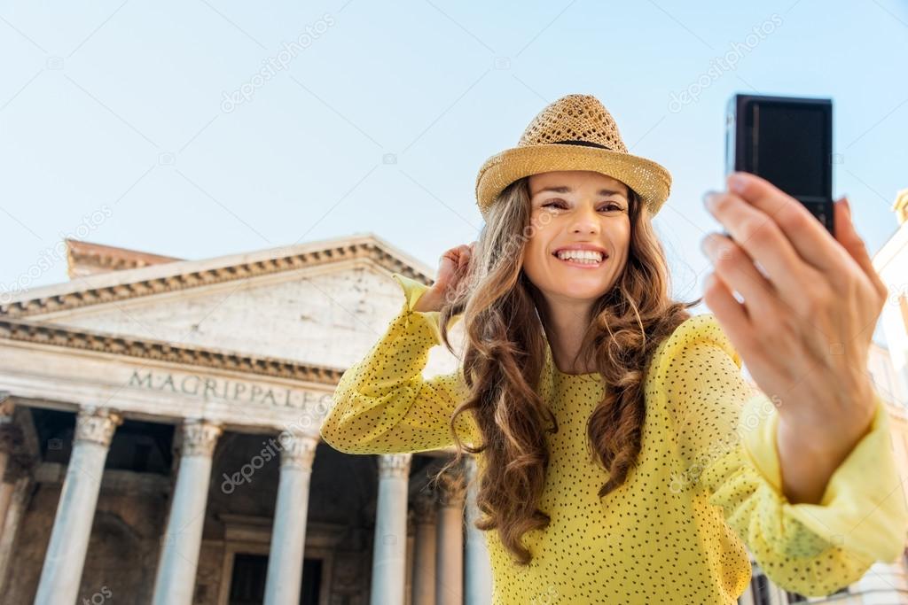 Closeup of woman taking selfie at Pantheon cheering