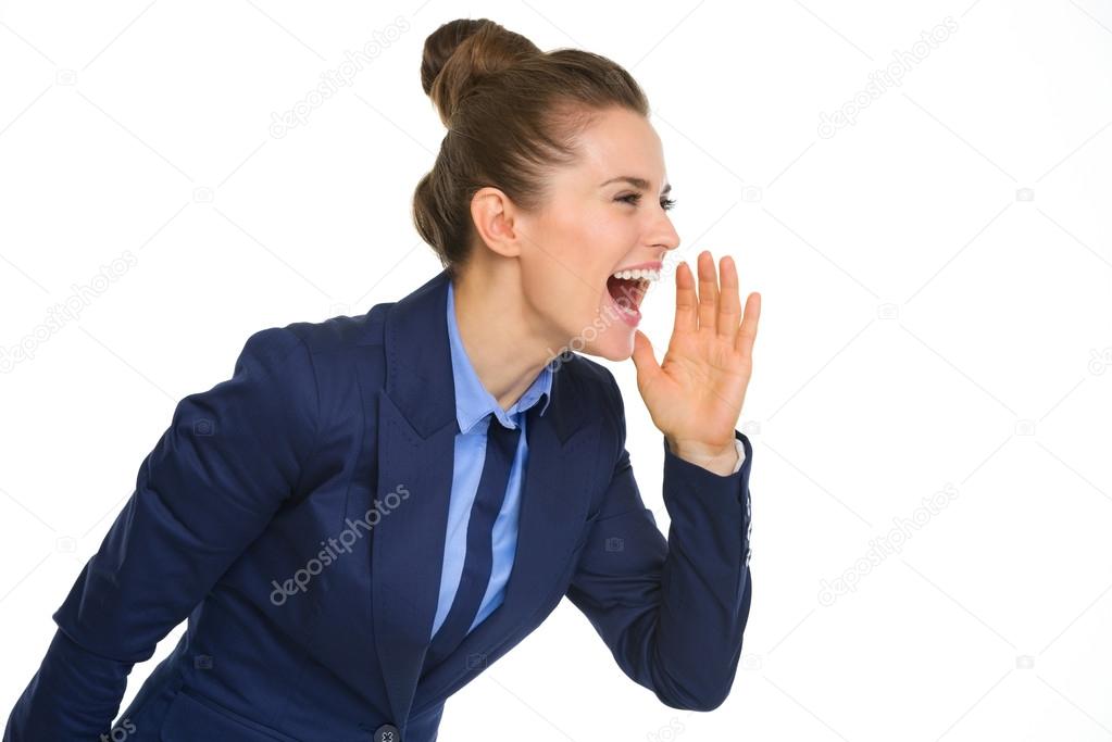 Happy businesswoman shouting and cupping hand to mouth