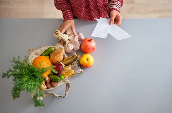Closeup from above of fall fruits and vegetables in kitchen