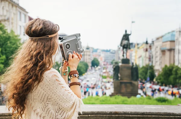 Trendy hippie woman tourist with vintage retro camera  in Prague — Zdjęcie stockowe