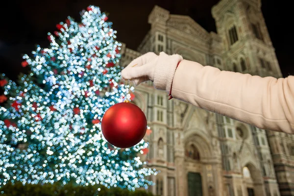 Closeup on hand pretend decorating Christmas tree in Florence — Φωτογραφία Αρχείου