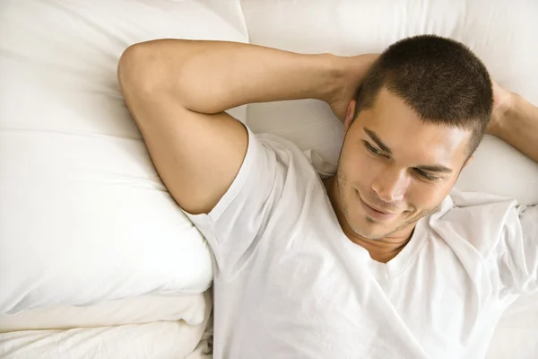 Man in bed. — Stock Photo, Image