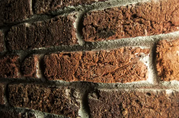 Τοίχο από τούβλα με πλευρά φωτισμός — Φωτογραφία Αρχείου