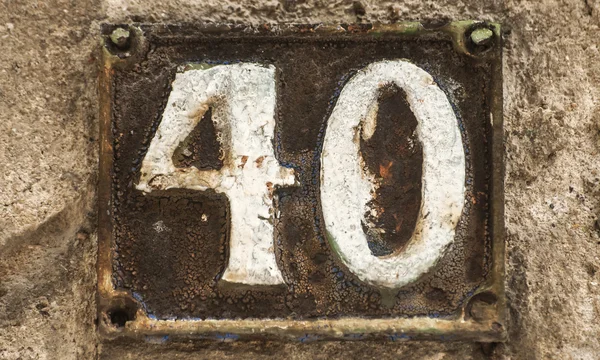 Old retro cast iron plate number 40 — Stock Photo, Image
