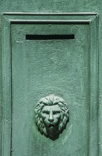 Green metal mailbox slit