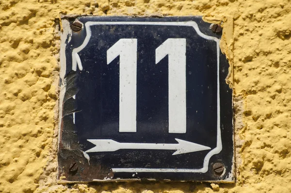 Placa esmaltada desgastada número 11 — Fotografia de Stock