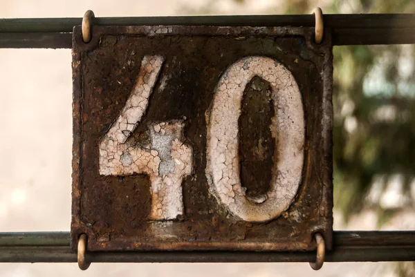 Old Retro Weathered Cast Iron Plate Number Closeup — Stock Photo, Image