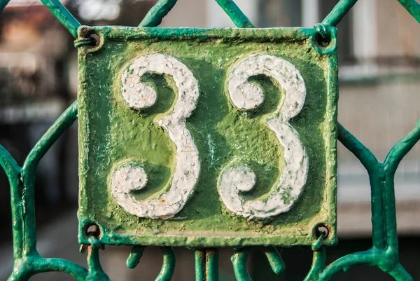 Old Retro Weathered Cast Iron Plate Number Closeup — Stock Photo, Image