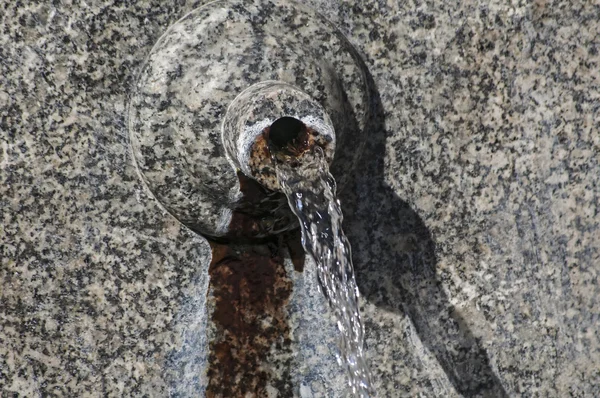 Stone spout of fountain — Stock Photo, Image