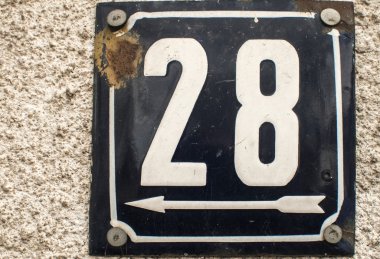 Weathered enameled plate number 28