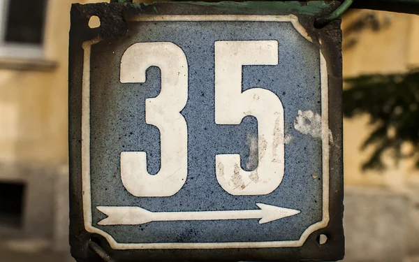 Weathered enameled plate number 35 — Stock Photo, Image