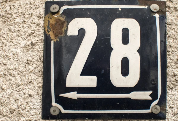 Weathered enameled plate number 28 — Stock fotografie