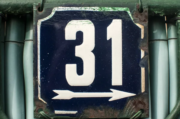 Weathered enameled plate number 31 — Stock Photo, Image