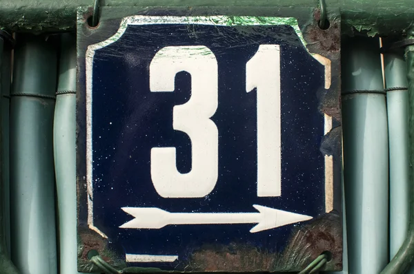Weathered enameled plate number 31