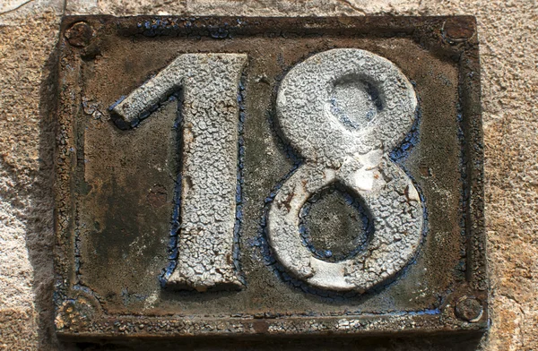 Стара ретро-залізна пластина номер 18 — стокове фото