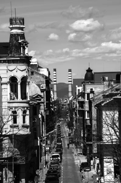 stock image Old town street and heating plant